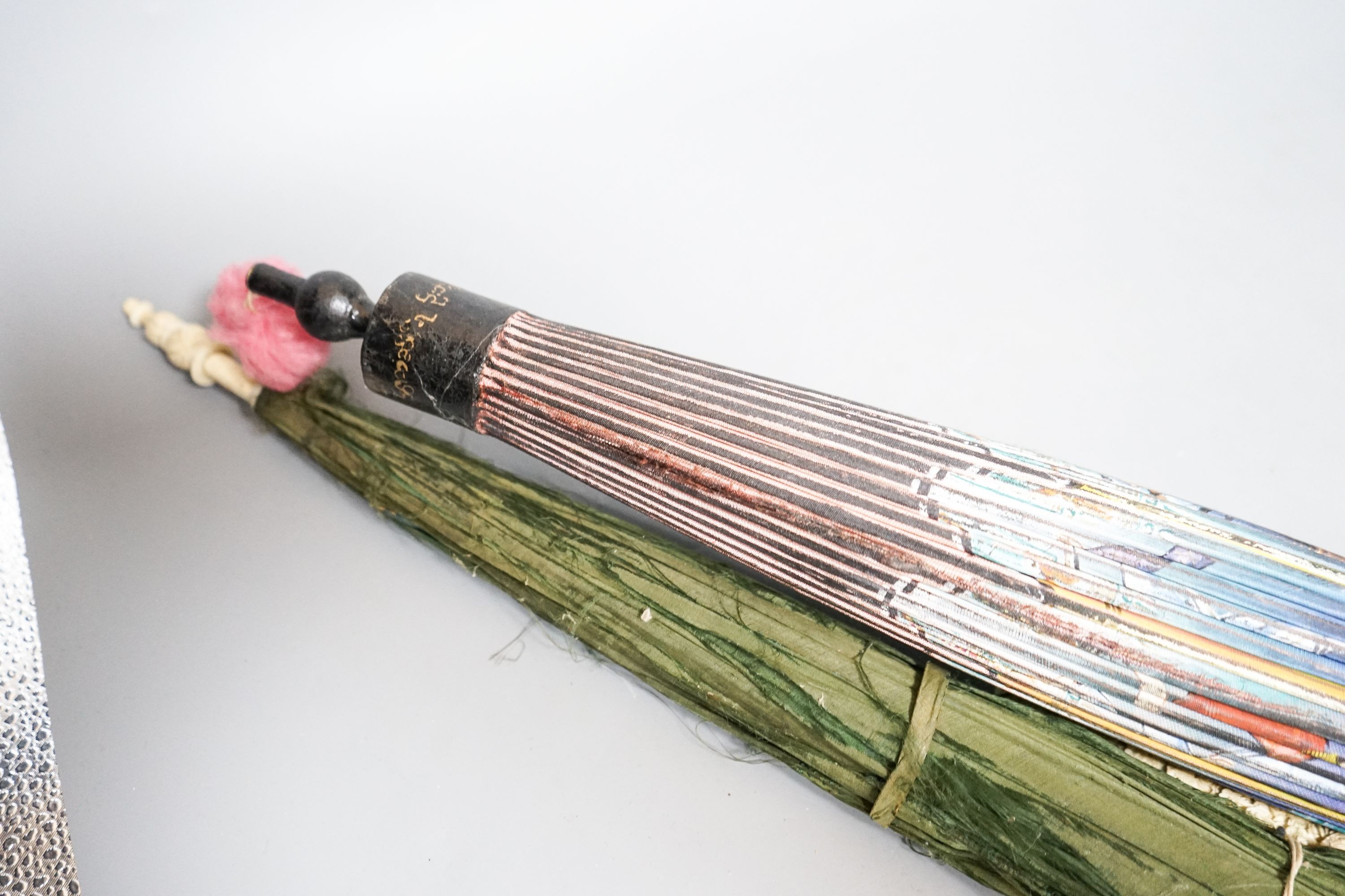A 19th century Chinese Canton export ivory parasol with carved Ivory handle and a Burmese white metal handled painted fabric parasol